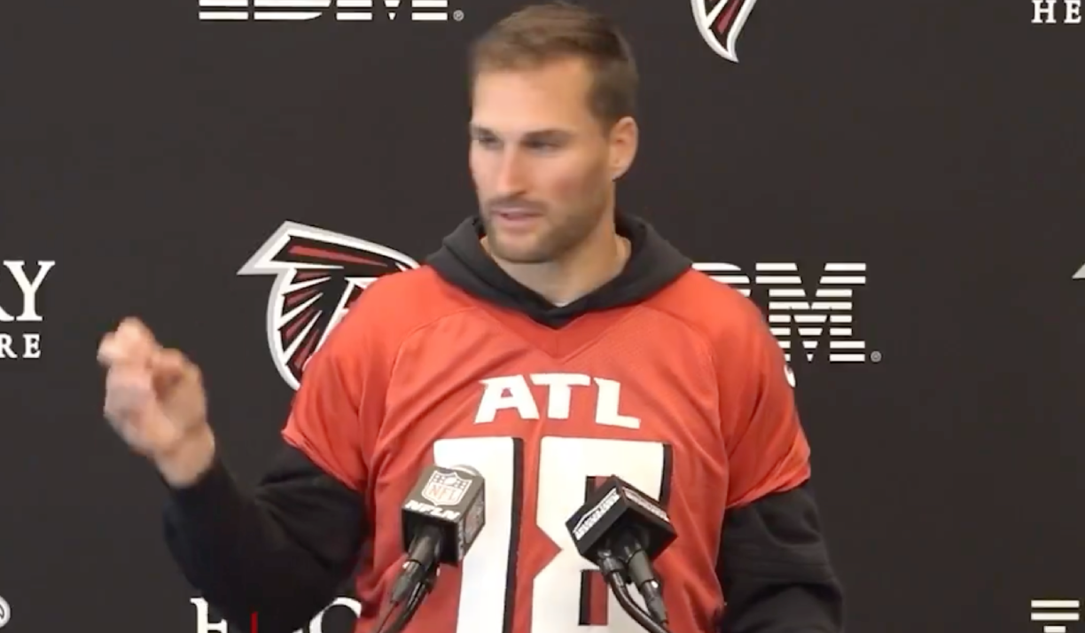 Kirk Cousins talks to media